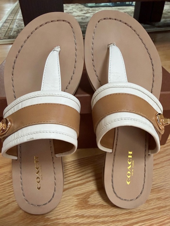 Coach Shoes - Coach  women’s 5.5M, White and Tan Eileen Leather Slide Sandals with Gold Logo.